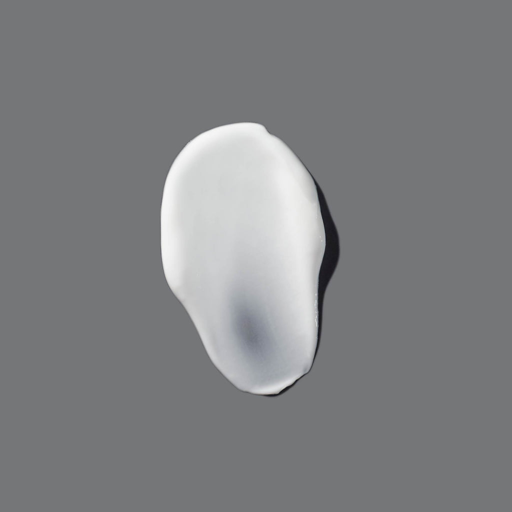 Dermalogica Body Hydrating Cream swatch on grey background