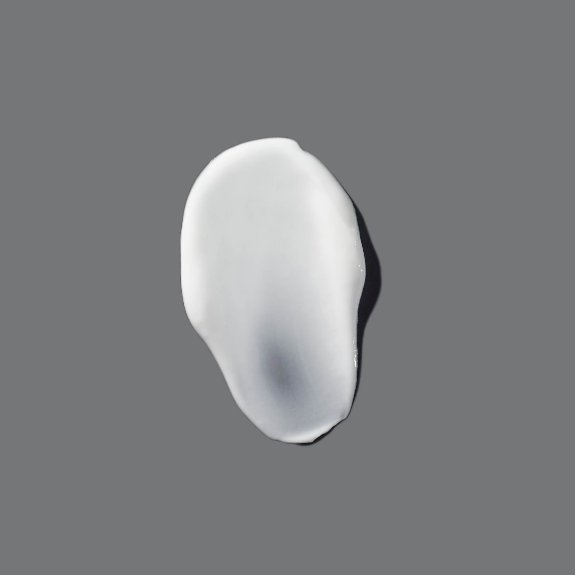 Dermalogica Body Hydrating Cream swatch on grey background